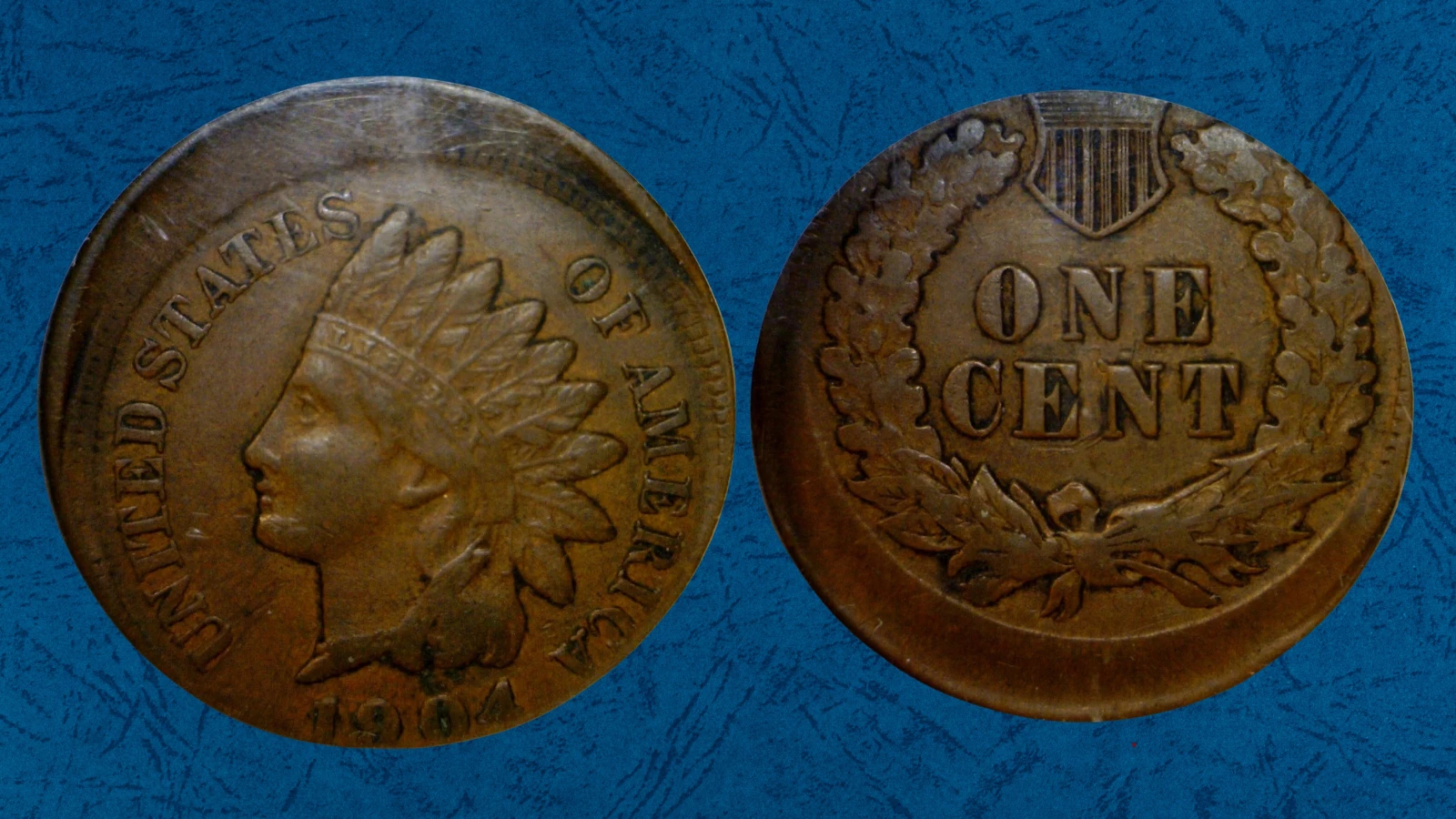 1904 Indian Head Penny off-center strike error showing shifted design and crescent of blank planchet
